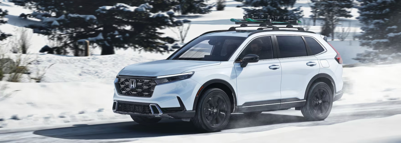 2024 Honda CR-V Sport Touring Hybrid with AWD shown in Platinum White Pearl