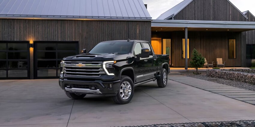 2026 Chevy Silverado 1500 light-duty vs 2026 Chevy Silverado 2500 heavy-duty pickup truck contrast layout at Executive Chevrolet
