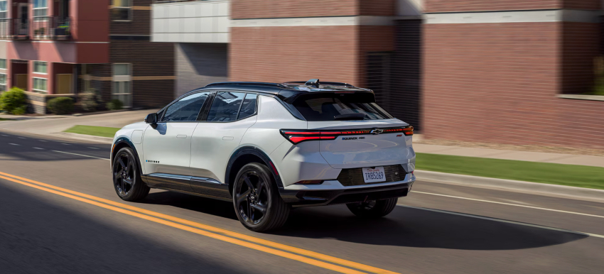 2026 Chevy Equinox EV driving on road
