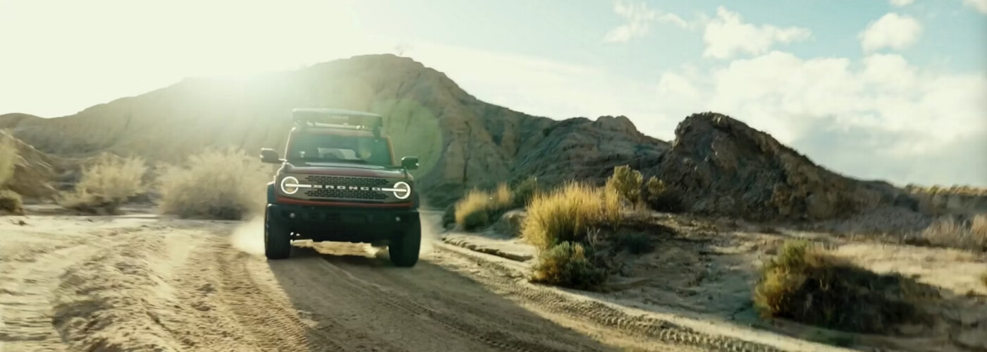 2026 Ford Bronco driving on dirt road