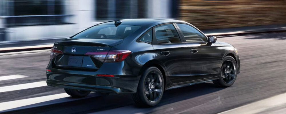 2026 Honda Civic Sedan exterior black driving on road