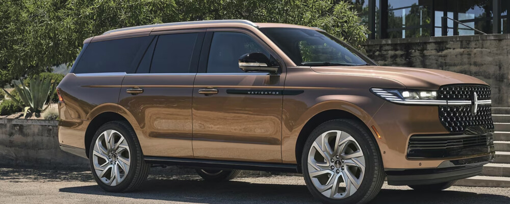 exterior shot of copper lincoln navigator parked