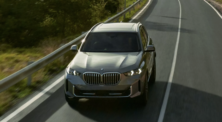 2026 BMW X5 exterior driving on road