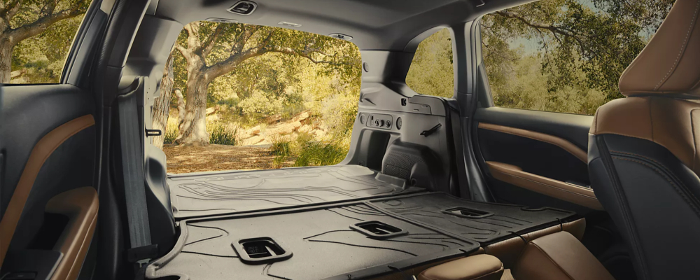 2026 Subaru Forester Cargo Area with 60/40-Split Flat-Folding Rear Seatbacks Shown with Accessory Equipment