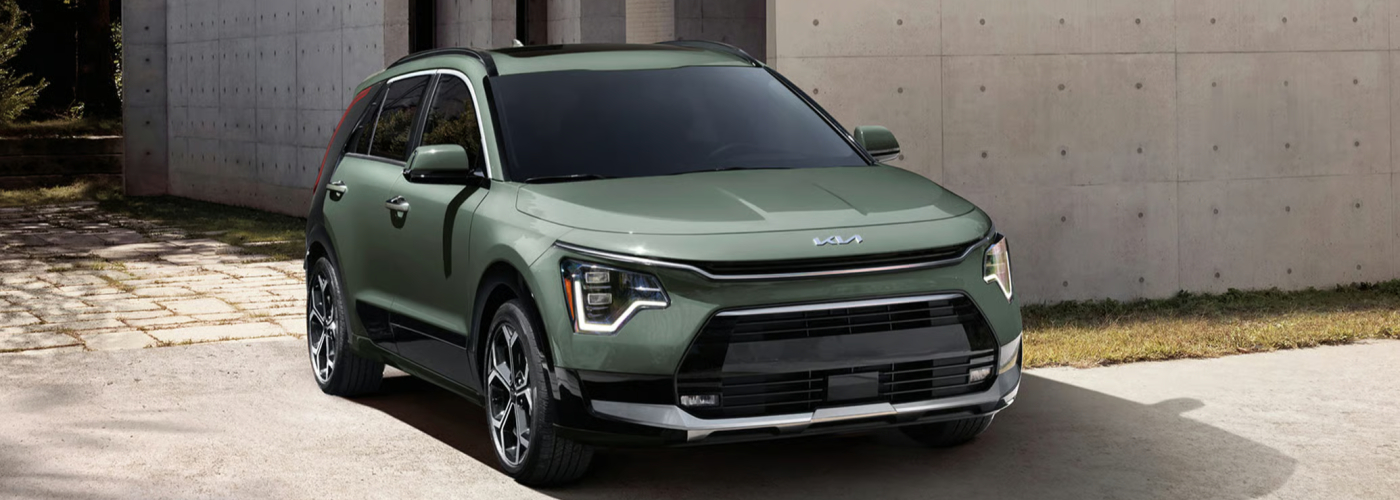 2026 Kia Niro Hybrid SX Touring in Cityscape Green Color with Black Aeroblade, LED daytime running lights (DRLs), and Power Sunroof