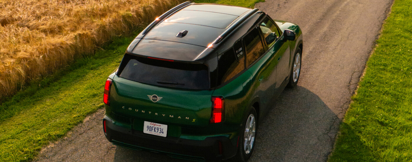 2025 MINI Countryman SE ALL4 driving through a field
