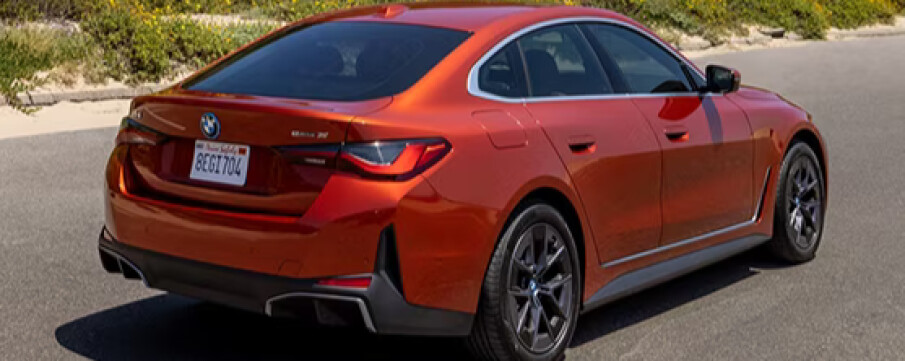 A red 2024 BMW i4