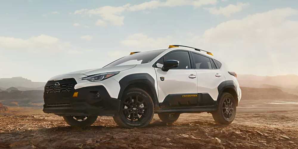 2026 Subaru Crosstrek outside parked on dirt with sunset 