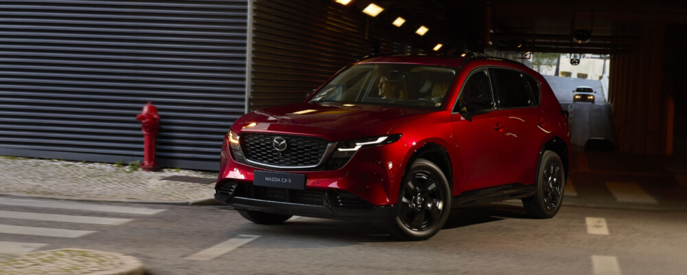 2026 Mazda CX-5 Driving Exterior Red