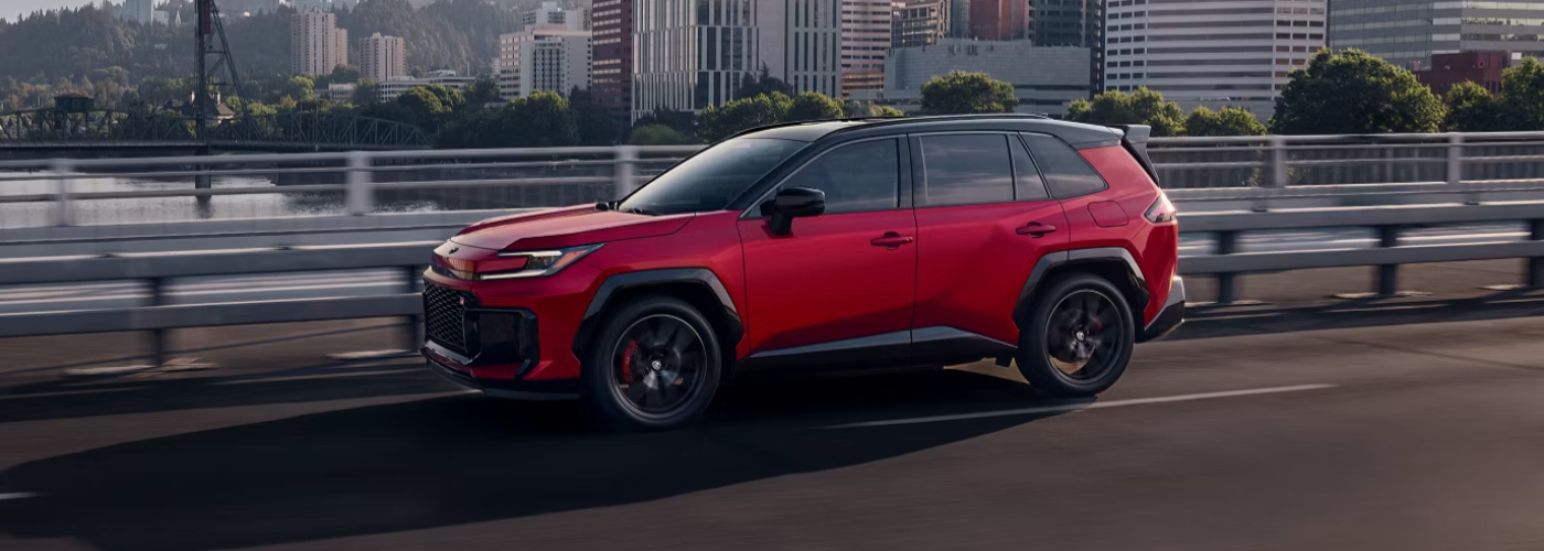 2026 Toyota RAV4 Hybrid GR SPORT shown in Supersonic Red with Midnight Black Metallic Roof