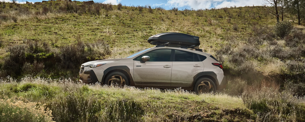 2026 Subaru Crosstrek Limited Hybrid Shown in Sand Dune Pearl with Accessory Equipment