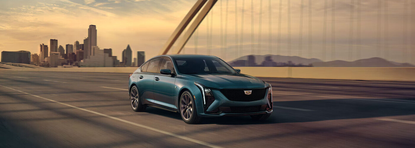 2026 Cadillac CT5 driving across bridge