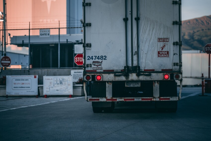 Truck entering gate Truck entering gate