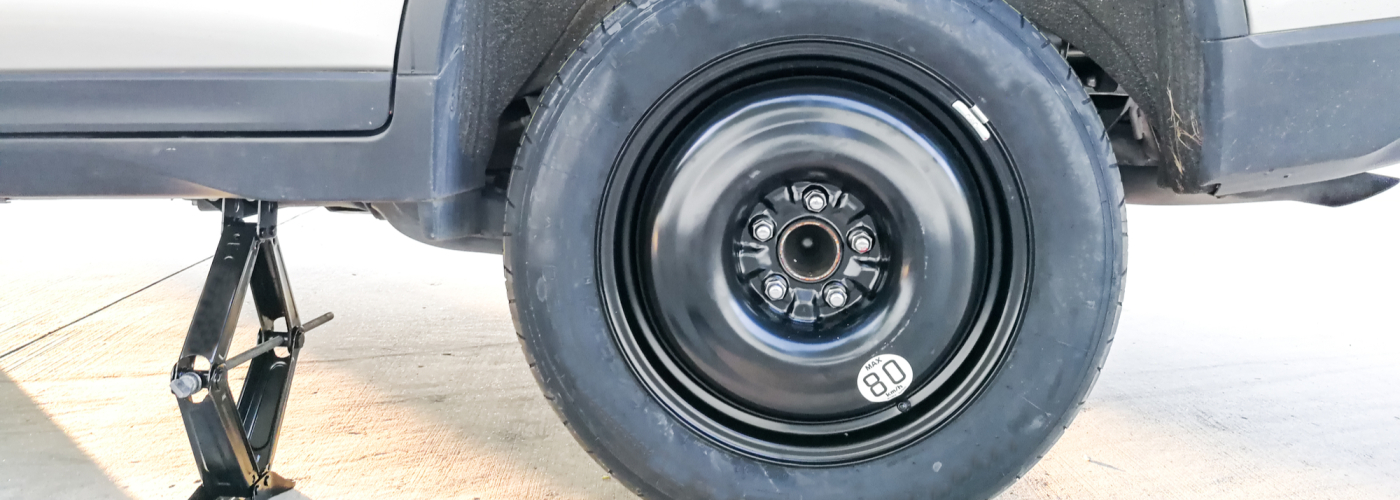 Spare Tire on jacked up car