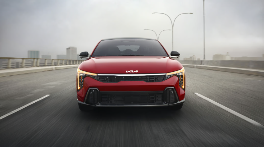 2026 Kia K4 GT-Line Turbo in Currant Red Color with Amber Daytime Running Lights and Cube Projector Headlights