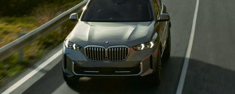 2026 BMW X5 exterior driving on road