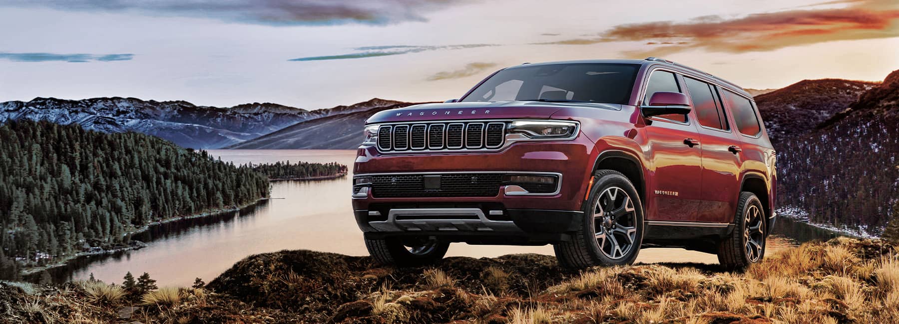 2022 Jeep Wagoneer Series III Velvet Red Pearl on mountain lake