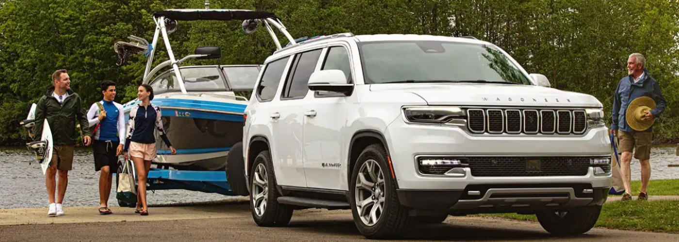 White2022 Jeep Wagoneer Towing a Boat