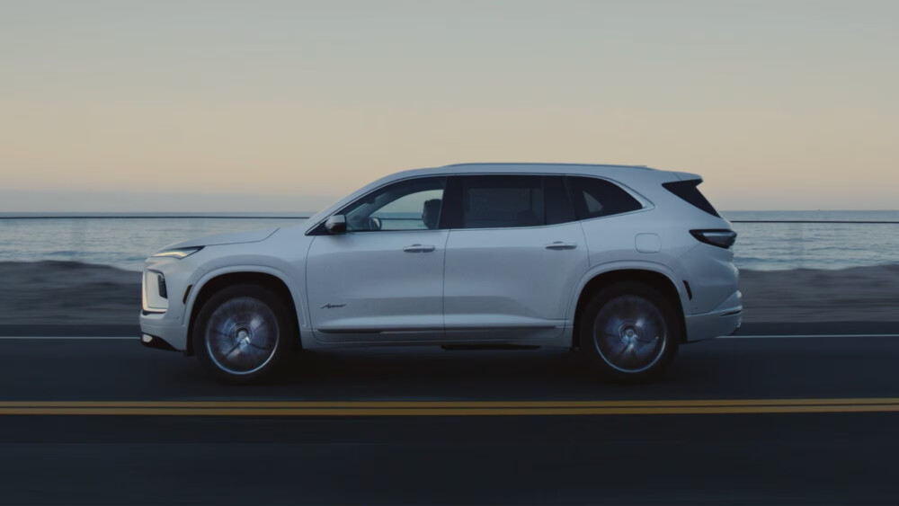 2026 Buick Enclave driving next to beach 