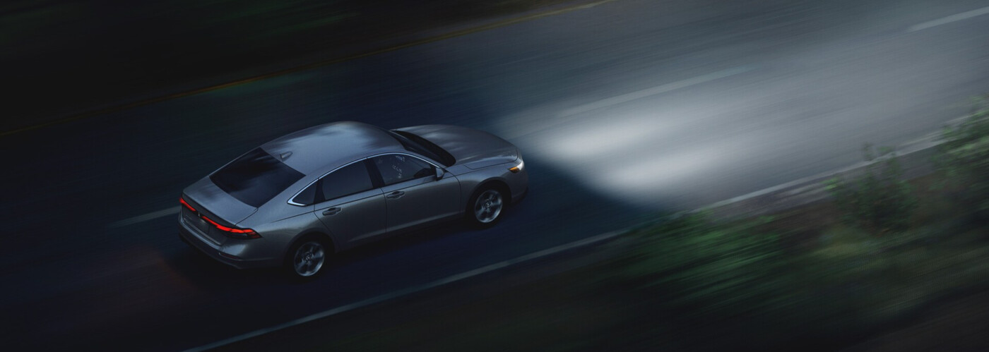 2025 Honda Accord Hybrid 2025 Honda Accord Hybrid driving on night road