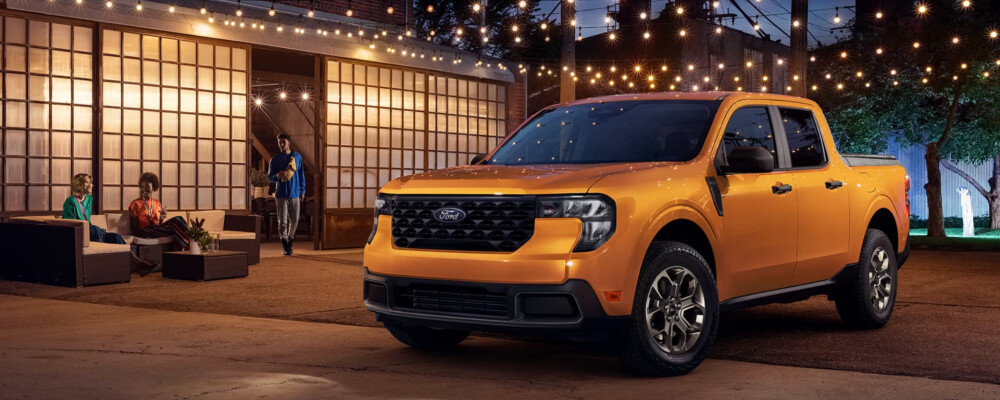 Yellow 2026 Ford Maverick Hybrid at night
