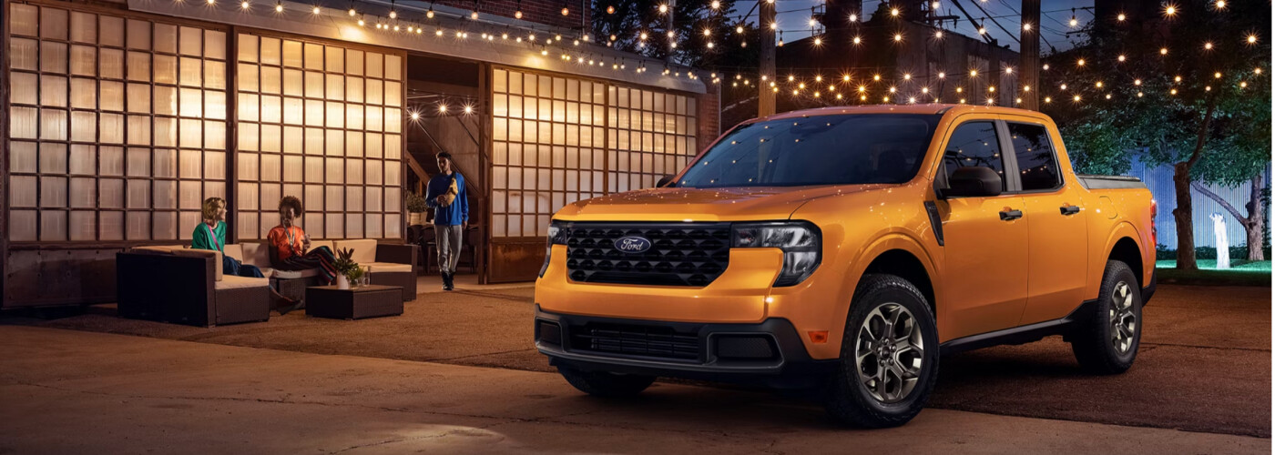 Yellow 2026 Ford Maverick Hybrid at night