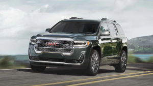 2022 GMC Acadia driving on a coastal highway