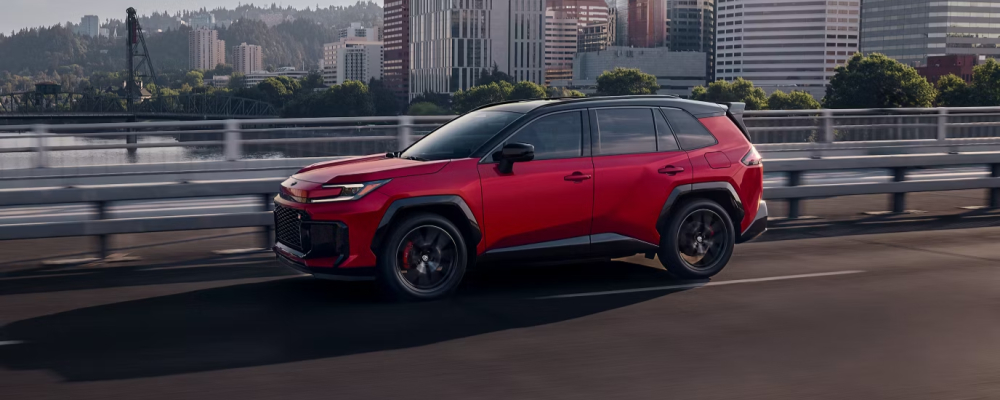 2026 Toyota RAV4 Hybrid GR SPORT shown in Supersonic Red with Midnight Black Metallic Roof