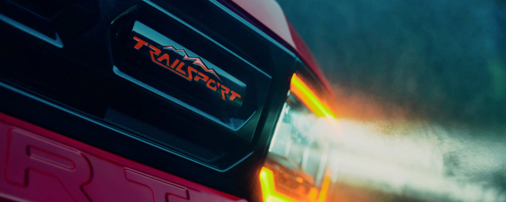 2026 Honda Passport TrailSport Elite shown in Radiant Red Metallic