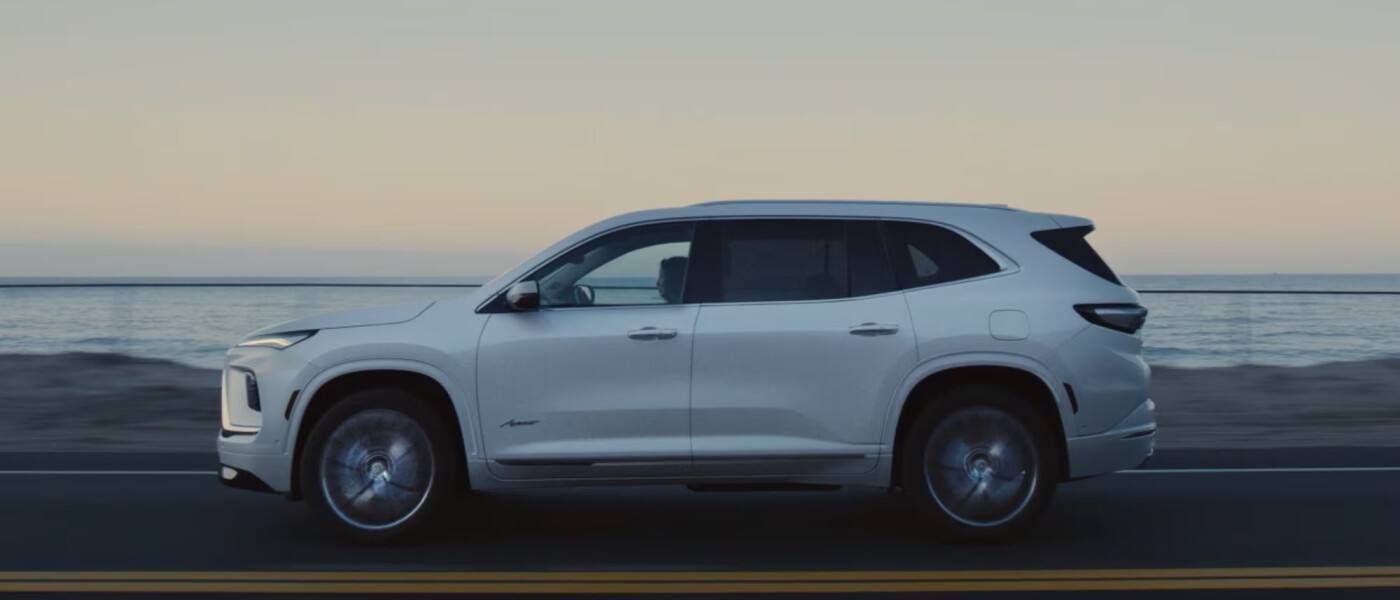 2026 Buick Enclave driving next to beach 