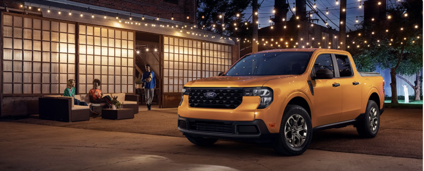Yellow 2026 Ford Maverick Hybrid at night