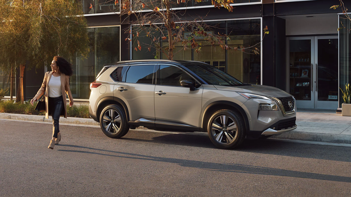 2023 Nissan Rogue Parked by Storefront