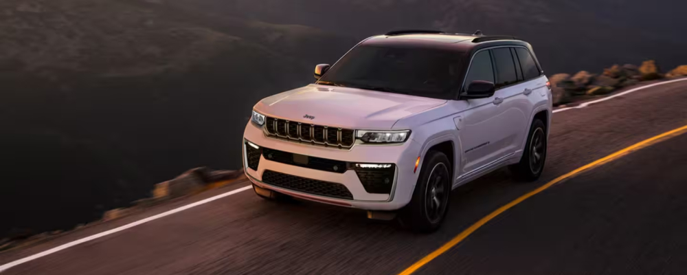 2026 Jeep Grand Cherokee Driving on a scenic road