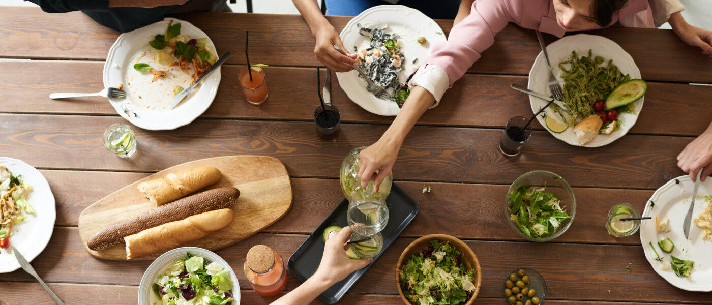 Group of friends eating at restaurant