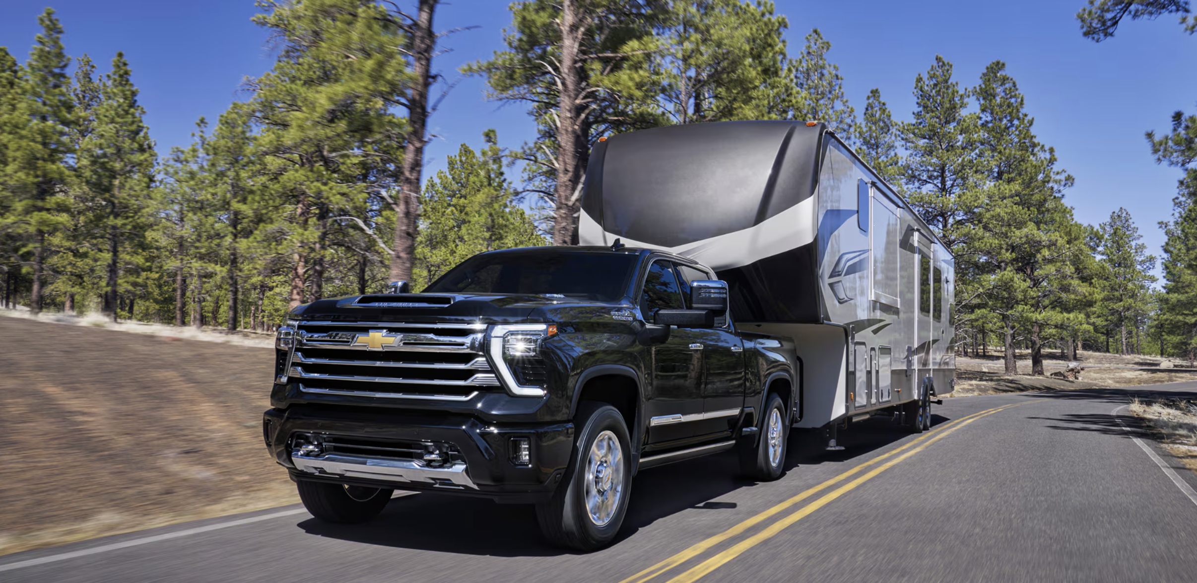 2026 Chevrolet Silverado 2500HD towing recreational vehicle