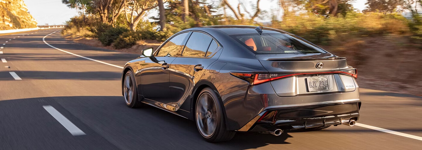 2025 Lexus IS driving down road