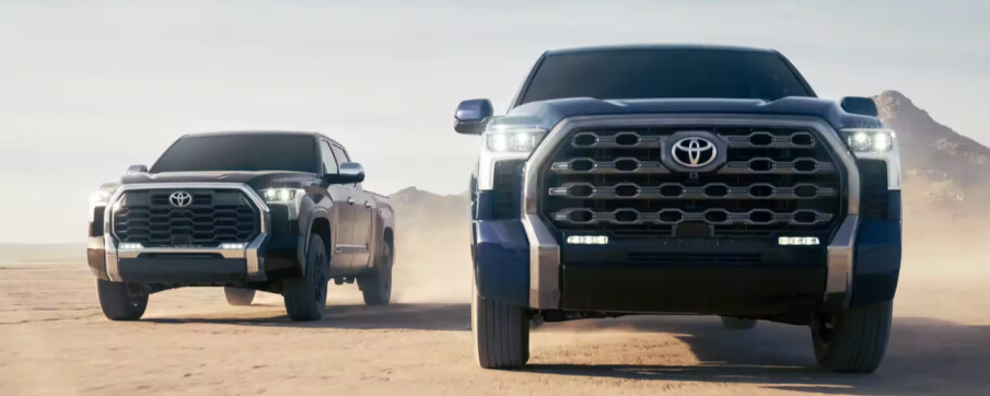 2 2024 Toyota Tundras on dirt road