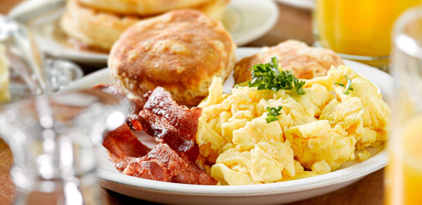 Breakfast Plate with eggs, bacon, and biscuits. Breakfast Plate with eggs, bacon, and biscuits.