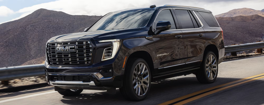 2026 GMC Yukon Denali Driving on Road
