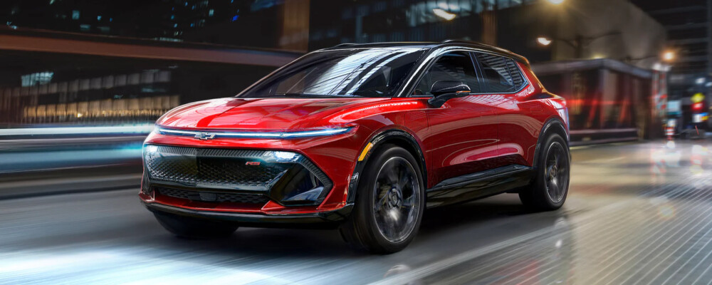 2024 Chevy Equinox EV driving at night