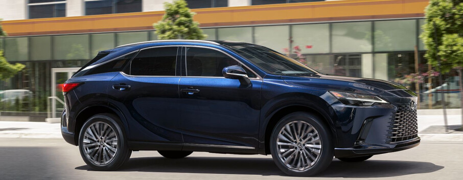 A Blue Lexus RX driving on a road