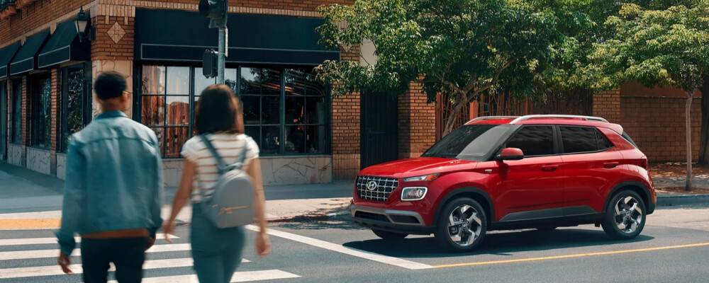 2023 Hyundai Venue at a crosswalk 2023 Hyundai Venue at a crosswalk