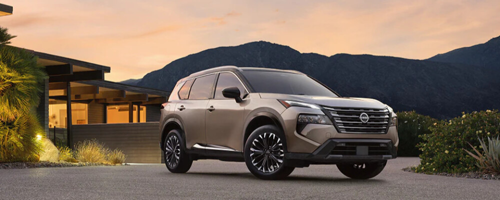 Nissan Pathfinder parked outside at sunset