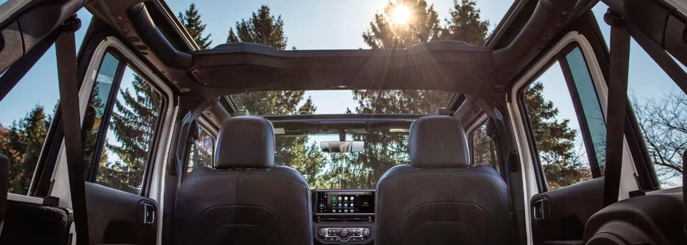 Front interior and dashboard of the 2026 Jeep Wrangler available near Columbus, OH at Byers Chrysler Jeep Dodge Ram