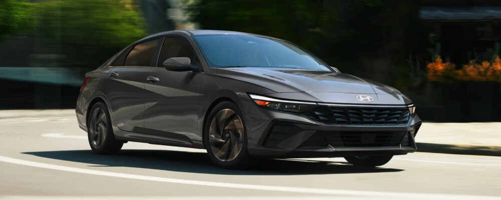 Driving gray 2025 Hyundai Elantra Hybrid