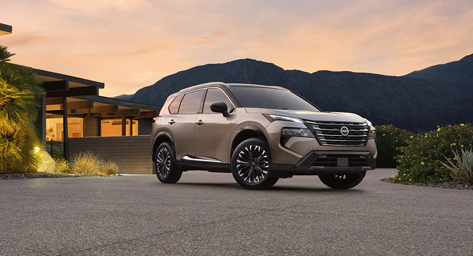 2026 Nissan Rogue 2026 Nissan Rogue in front of a sunset
