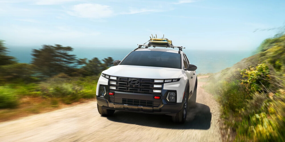 2026 Hyundai Santa Cruz driving on dirt road