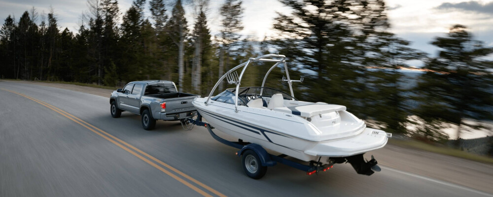 2020 Toyota Tacoma towing a boat