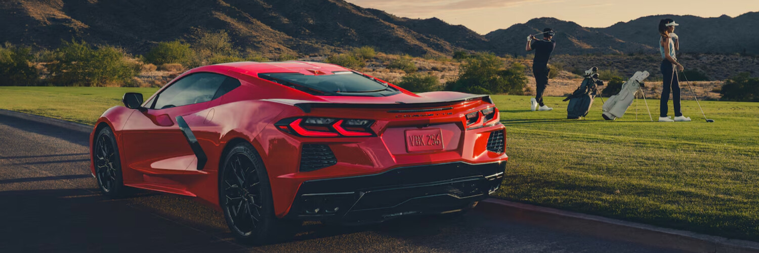 2026 Chevrolet Corvette Stingray 2026 Chevrolet Corvette Stingray parked near people golfing
