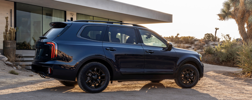 2025 Kia Telluride parked in front of a house